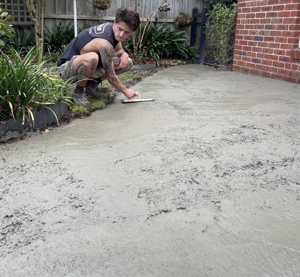Concrete base for paving and shed